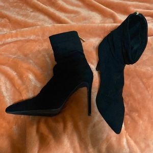 Size 10 Oda Black “suede” booties with 5” stiletto heel.
